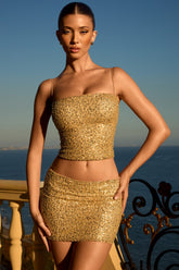 Nilsu-Embellished Mid-Rise Micro Mini Skirt in Gold