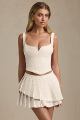 Nada-Layered Pleated Low-Rise Mini Skirt in Ivory