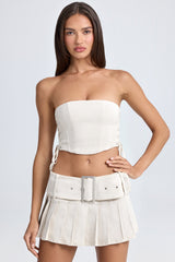 Devora-Belted Pleated Low-Rise Micro Mini Skirt in Ecru