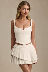 Nada-Layered Pleated Low-Rise Mini Skirt in Ivory